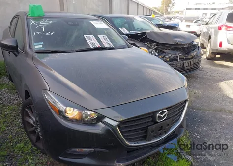 2018 Mazda Mazda3 Touring из США, поврежденный, VIN 3MZBN1V39JM257639